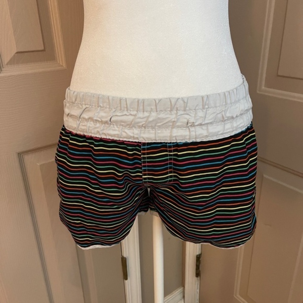 Billabong vintage black rainbow striped board swim shorts with white trim. M.